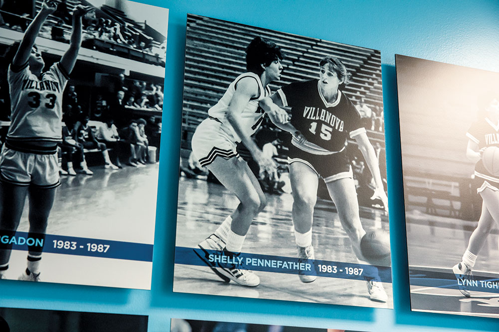 Black-and-white photo of Shelly Pennefather playing basketball