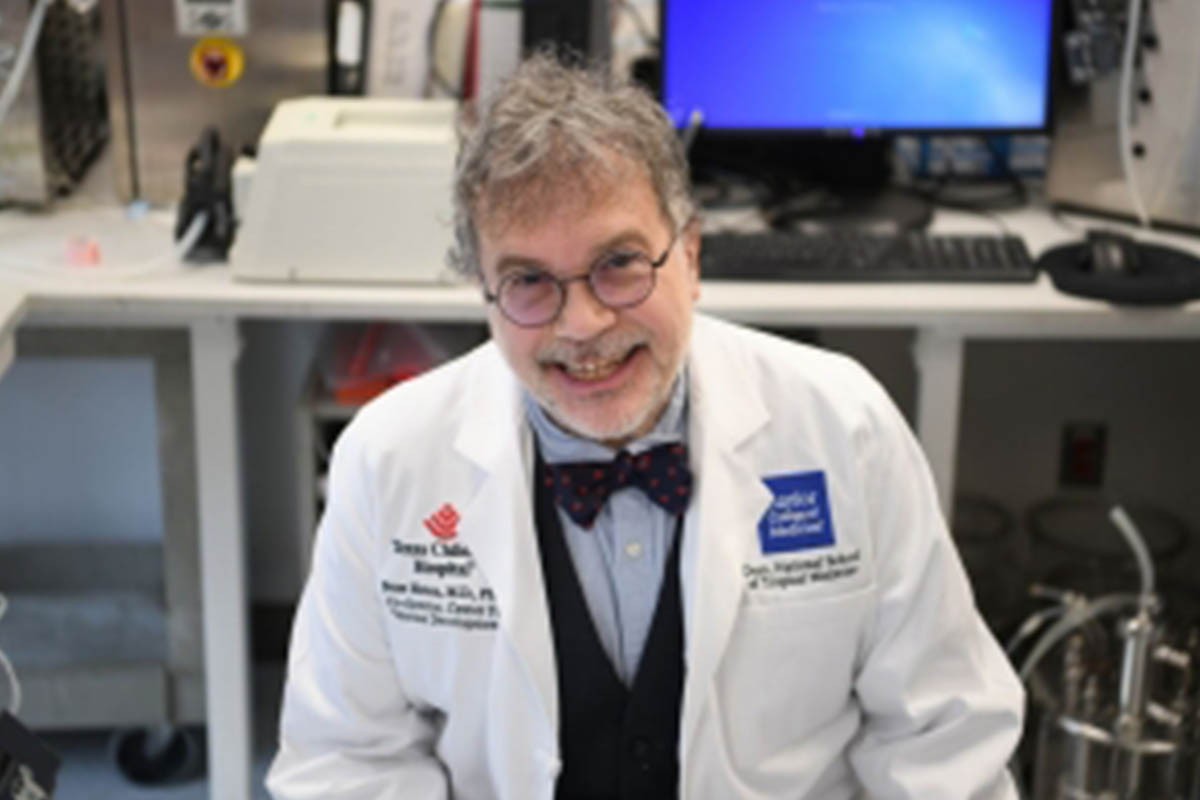 Pete Hotez smiling in a lab
