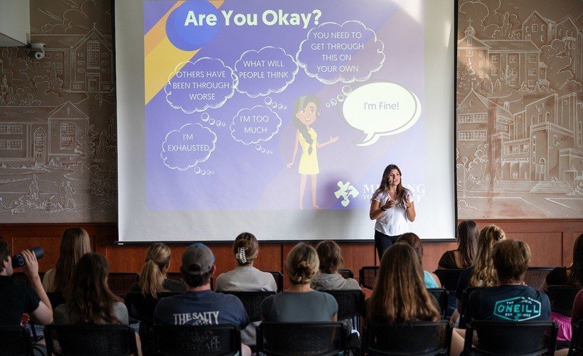 Calendar of Events Students listen to a presentation on mental health