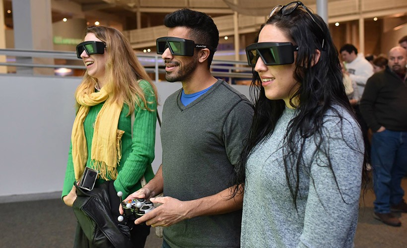 Students using virtual reality googles.