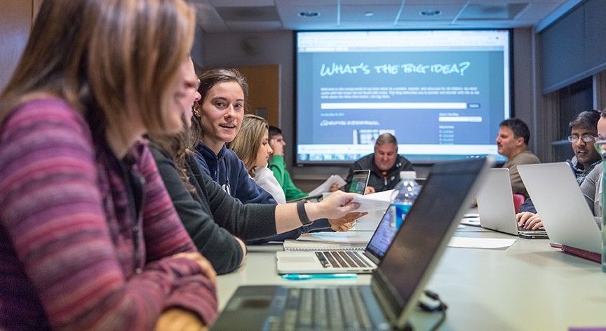 Graduate student discussion in seminar class Graduate student discussion in seminar class