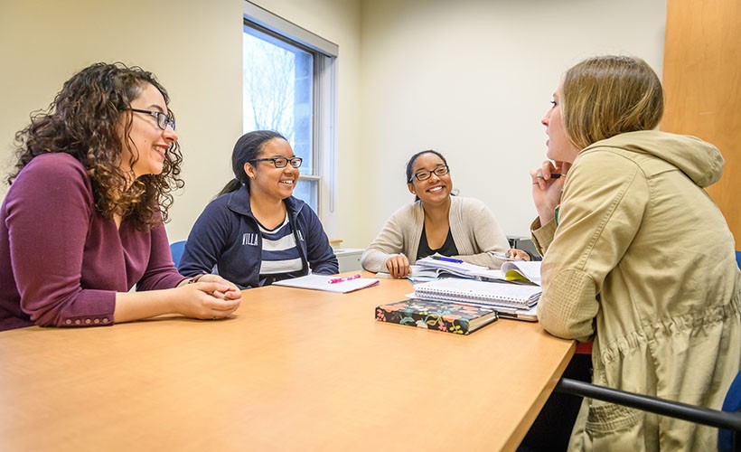 A group of Philosophy students engage in discussion. A group of Philosophy students engage in discussion.