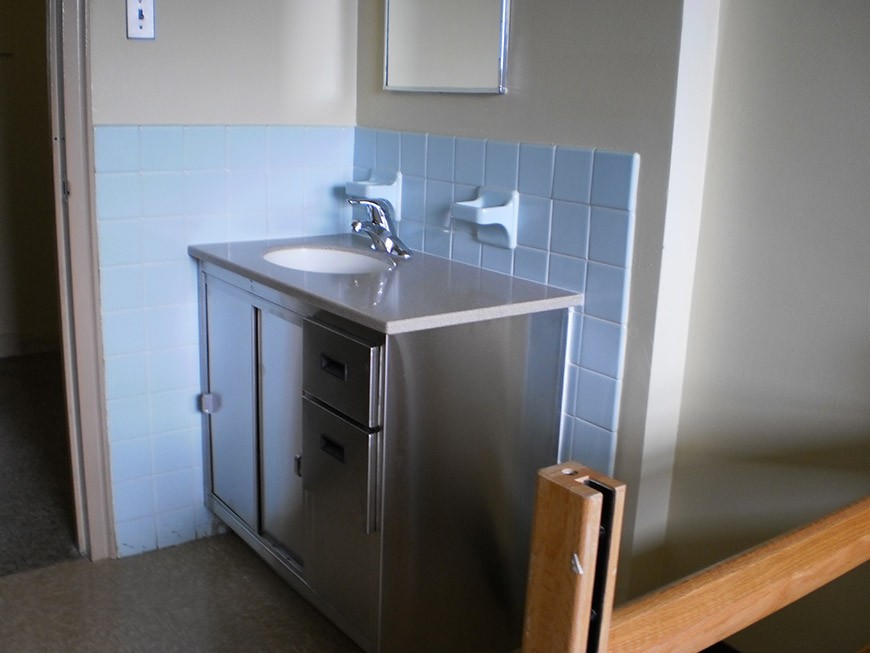 St. Mary's Hall single room View of the sink and vanity area in a St. Mary's Hall single room.