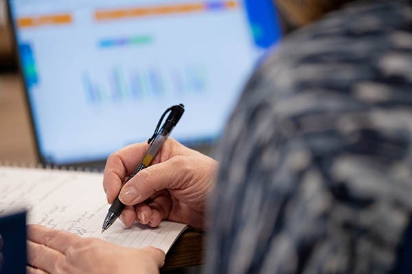 Individual-writing-with-pen