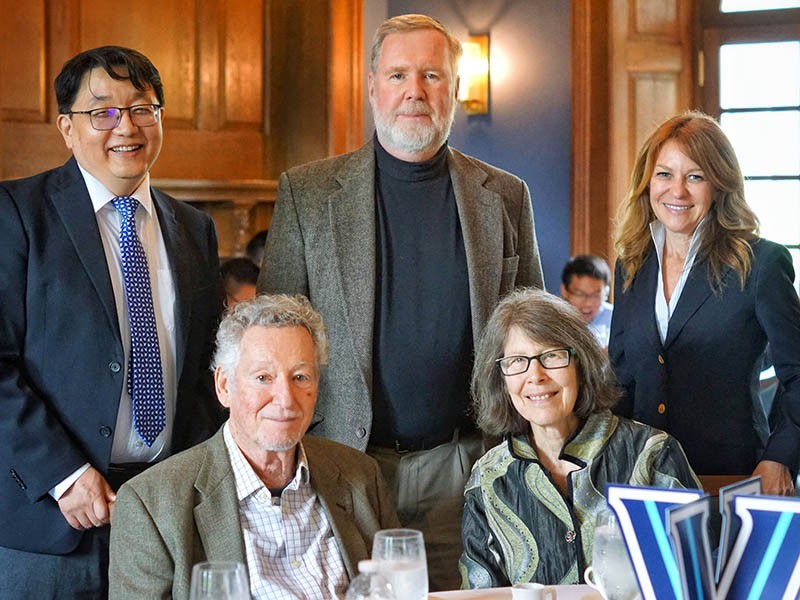Dr. Sheldon Weinbaum (seated, left) and his wife, Sandy, are joined by Villanova professors Dr. Qianhong Wu (standing, left) and Dr. Jerry Jones and Dean Michele Marcolongo at the Inn at Villanova. Dr. Sheldon Weinbaum (seated, left) and his wife, Sandy, are joined by Villanova professors Dr. Qianhong Wu (standing, left) and Dr. Jerry Jones and Dean Michele Marcolongo at the Inn at Villanova.