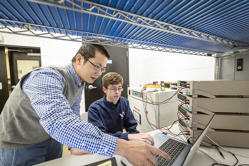 Dr. Zuyi (Jacky) Huang works with undergraduates in the Biological and Environmental Systems Engineering Laboratory Dr. Zuyi (Jacky) Huang works with undergraduates in the Biological and Environmental Systems Engineering Laboratory