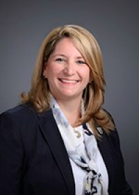 michelle.kelly@villanova.edu headshot of woman with blouse and jacket