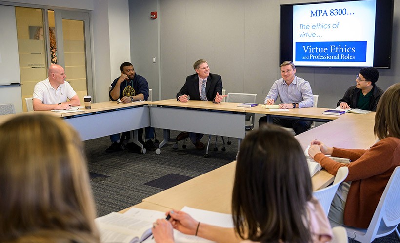 Students in discussion during an MPA class.