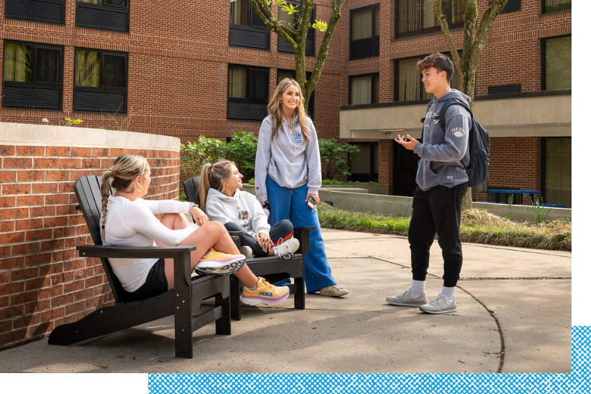 Student talking outside on South Campus